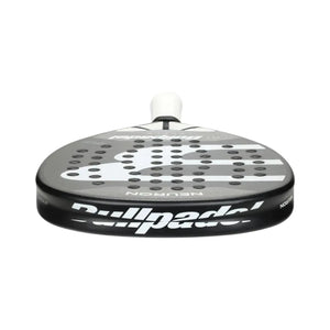 Close-up view of the BullPadel Padel Racket Neuron 2024 Fede Chingotto, featuring a black and white design with perforations and rounded edges. It has a light grip on the handle, Vibradrive for comfort, and is built with Xtend Carbon 3K for enhanced performance.