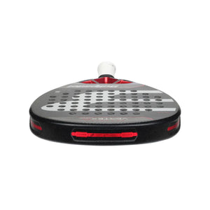 The Bullpadel Vertex 04 Comfort 2024 Martín Di Nenno is a red and black padel racket with perforated face, brand logos, and a diamond-shaped head. Wrapped in white grip tape, it boasts a sleek aerodynamic design with the CURVAKTIV system for enhanced performance.