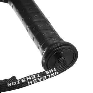 Close-up of the VOLT BOOSTERs black handle featuring a sleek wrist strap and white UNLEASH THE TENSION text, with embossed grip lettering. Elevate your Supercharger Smash Cap with Volt style and precision against a transparent backdrop.